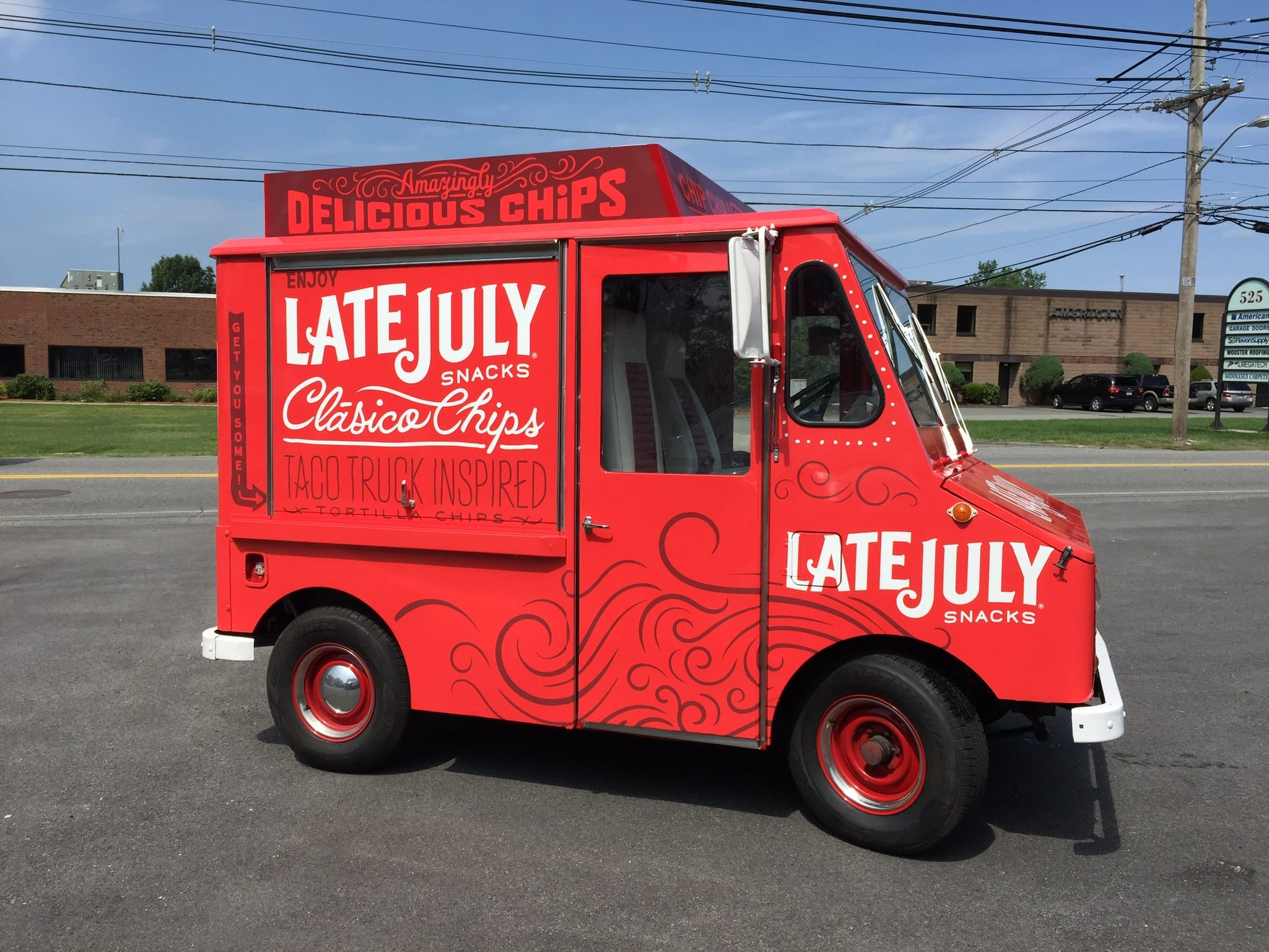 Bold custom food truck wrap design and installation in Boston MA
